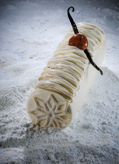 Pastel tronco Copo de nieve con vainilla, pera y castaña de Julien Perrinet